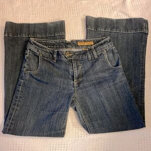 Seven dark wash jeanss size 8 flare faux back pockets